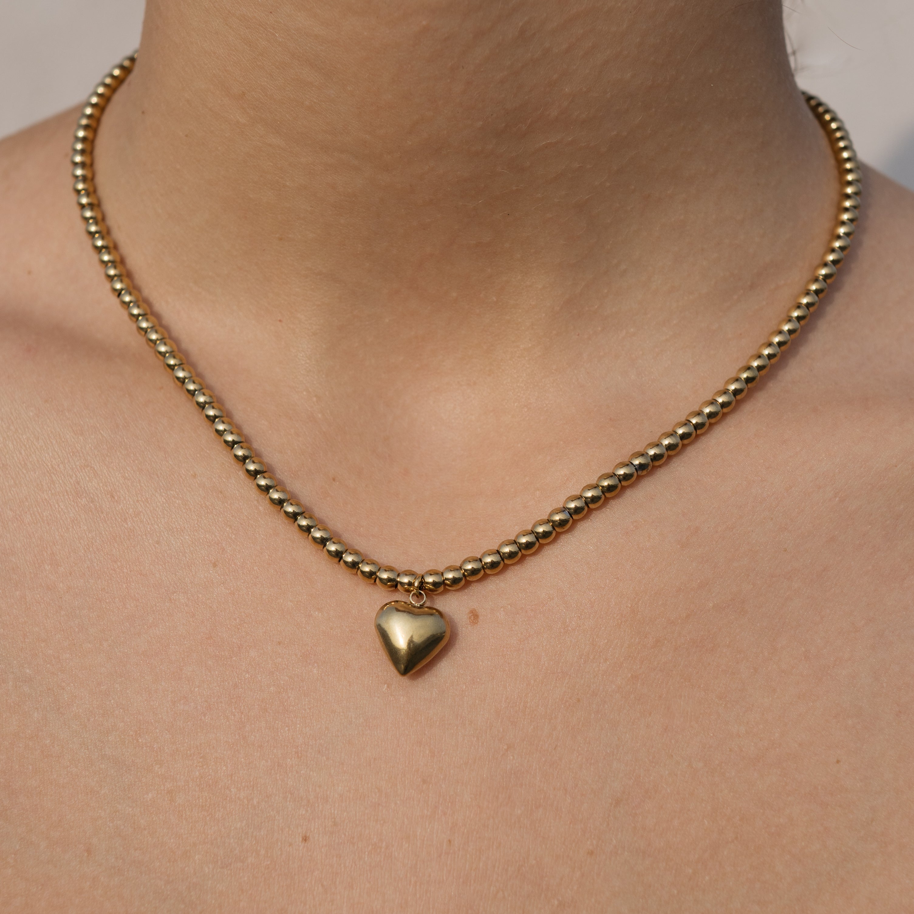 Golden Pearl heart necklace