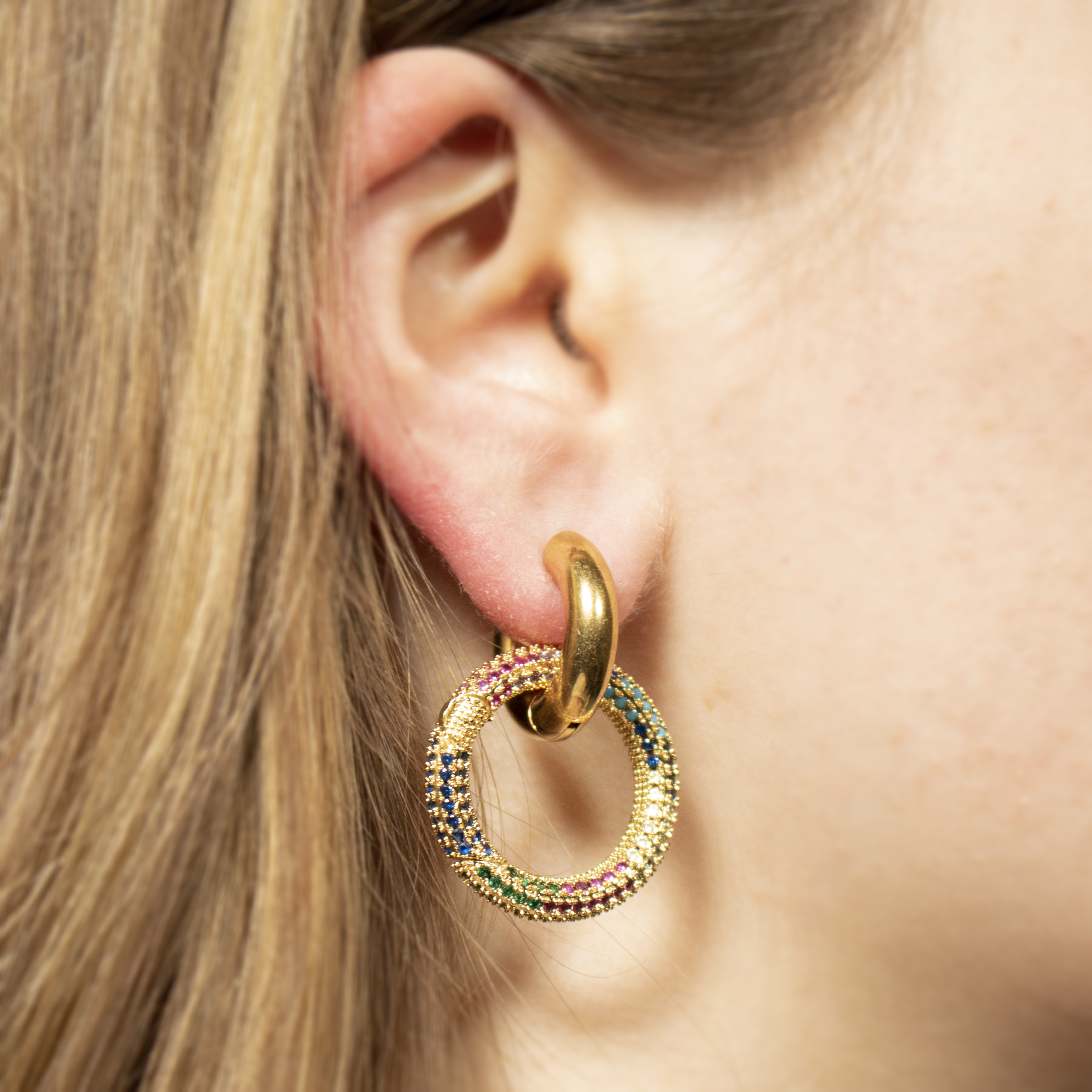 Hoop earrings with rainbow crystals