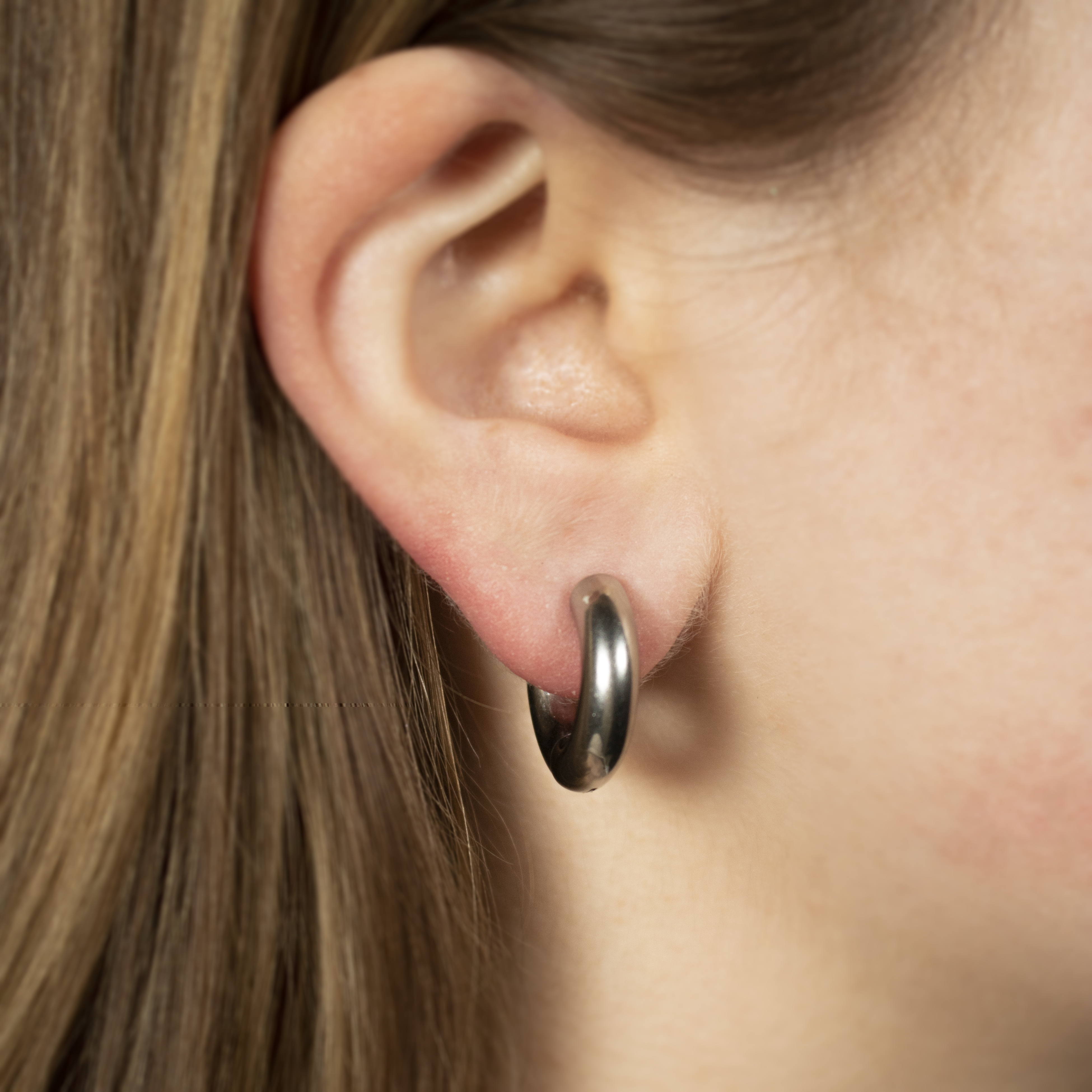 Silver hoop earrings with black link clasp